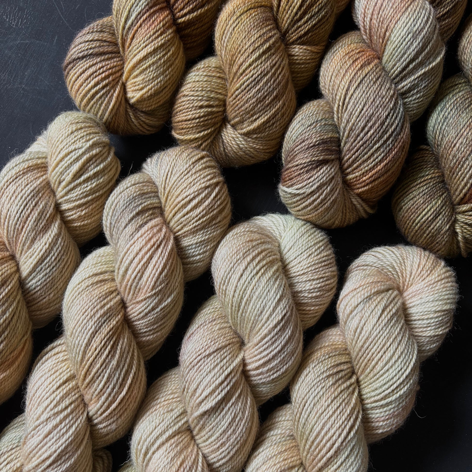 skeins of Soft Focus alongside Nest (the darker of the two colourways)